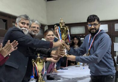 Anata Choudhury receiving his champion trophy at the prize giving ceremony. Photo : Collected