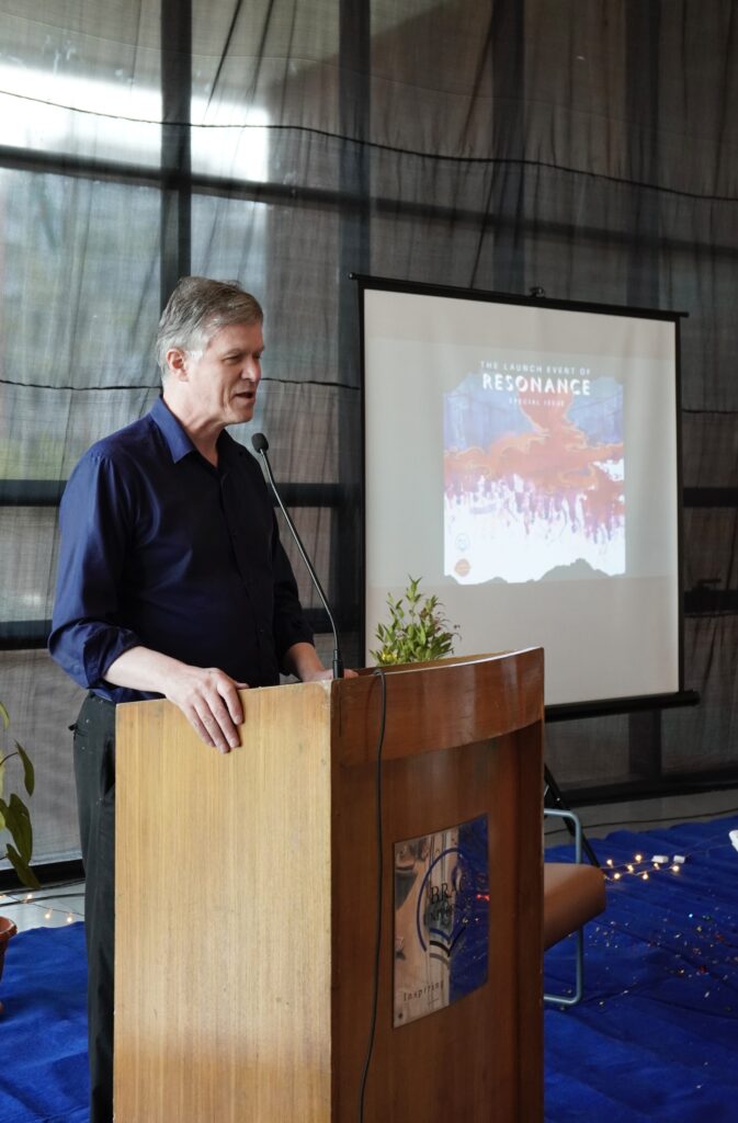 Honorable Registrar Dr. David Dowland at the launch of Resonance's latest issue. Photo Credit- Tamrin Alam Marwa